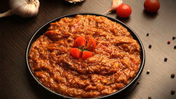 طرز تهیه میرزا قاسمی با بادمجان کبابی و طعم دودی
